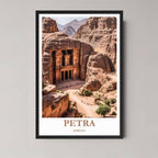 A framed, high-quality illustration of Petra's Al-Khazneh (The Treasury) carved into the rose-red rocks, shown in a classic black frame