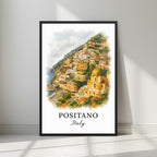 Framed art print of the iconic Positano cliffside village in a sleek black Ayous wood frame. Ideal for luxury Italian or coastal decor.