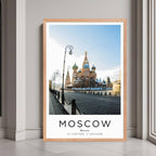 A framed print of Moscow, Russia, with a rustic red oak wood frame, highlighting the vibrant colors and unique architecture.