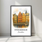 Framed art print of the iconic Gamla Stan colorful buildings and water in a sleek black Ayous wood frame. Ideal for luxury Scandinavian decor.