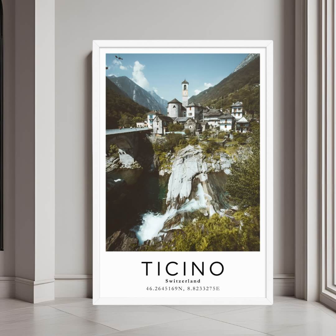  A framed wall art print of a serene Swiss village and waterfall with a minimalist white frame.