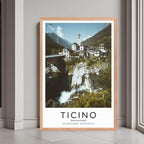 A framed poster of a village in Ticino, Switzerland, with a red oak wood frame, styled in a luxurious modern interior.