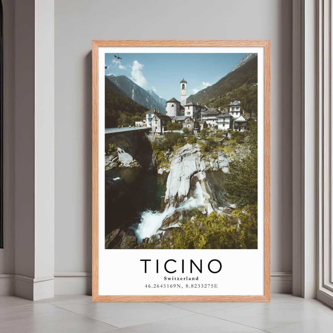 A framed poster of a village in Ticino, Switzerland, with a red oak wood frame, styled in a luxurious modern interior.