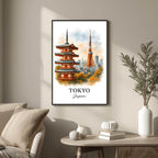 Large framed Tokyo print (Pagoda & Tower) hung above a sleek, minimalist sofa in a contemporary living room. Functions as the focal point of the luxury home decor.