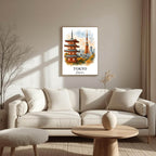 Full-scale view of the framed Tokyo print leaning against a clean white wall next to a small plant, showing the relative size and impact of the artwork.