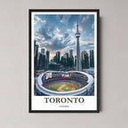 A framed, high-quality photo print of the Toronto skyline featuring the CN Tower and waterfront park under a bright, sunny sky, in a classic black frame