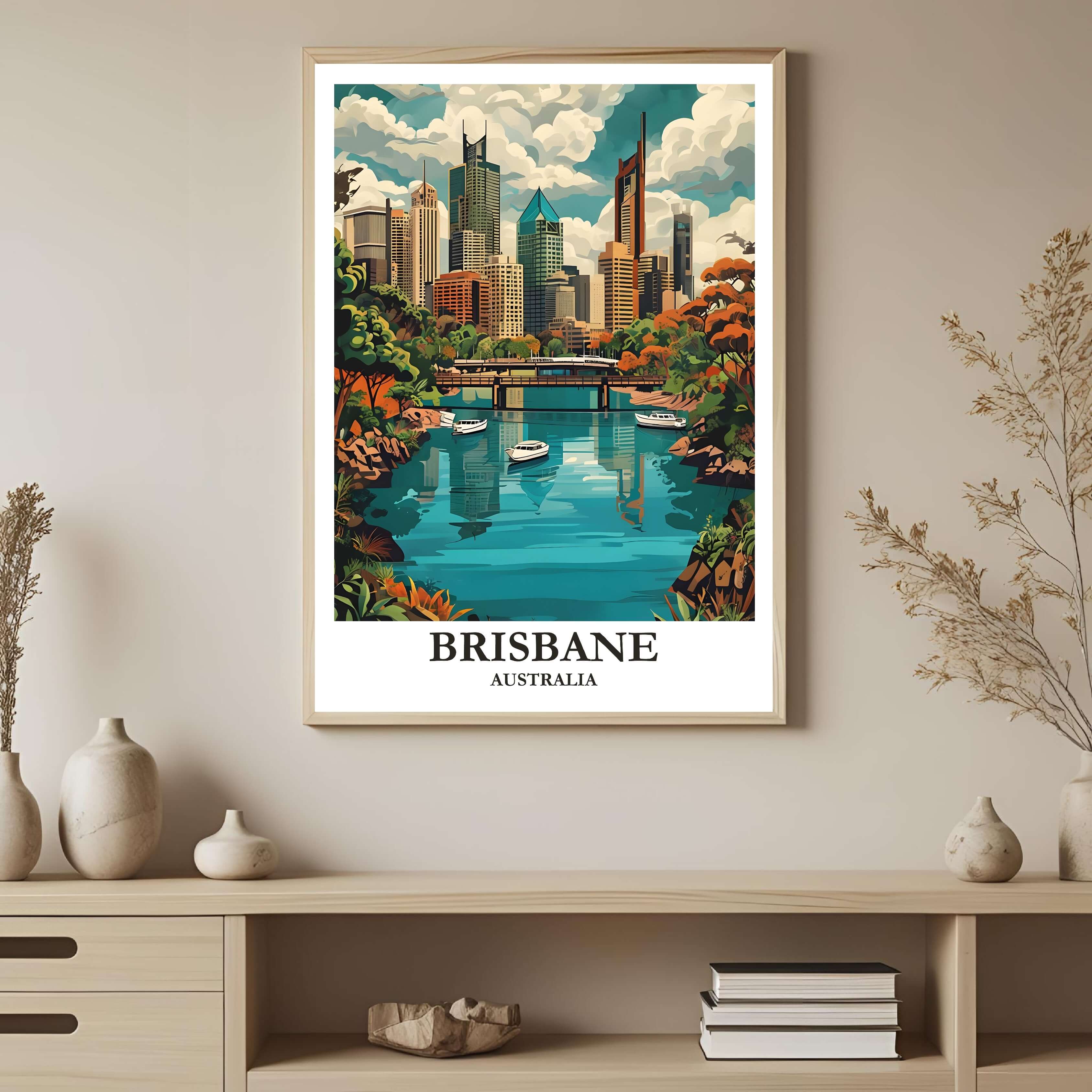 A framed art print depicting a vibrant Brisbane cityscape surrounded by tropical greenery, styled to complement a light and airy interior.