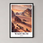  A framed, high-quality photo print of Wadi Rum, Jordan, showing towering red sandstone mountains and desert dunes under a dramatic sunset sky, in a classic black frame.